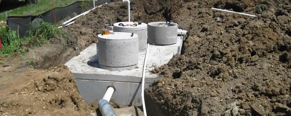 Septic system repair and installation site with tank access ports in Mesa, AZ